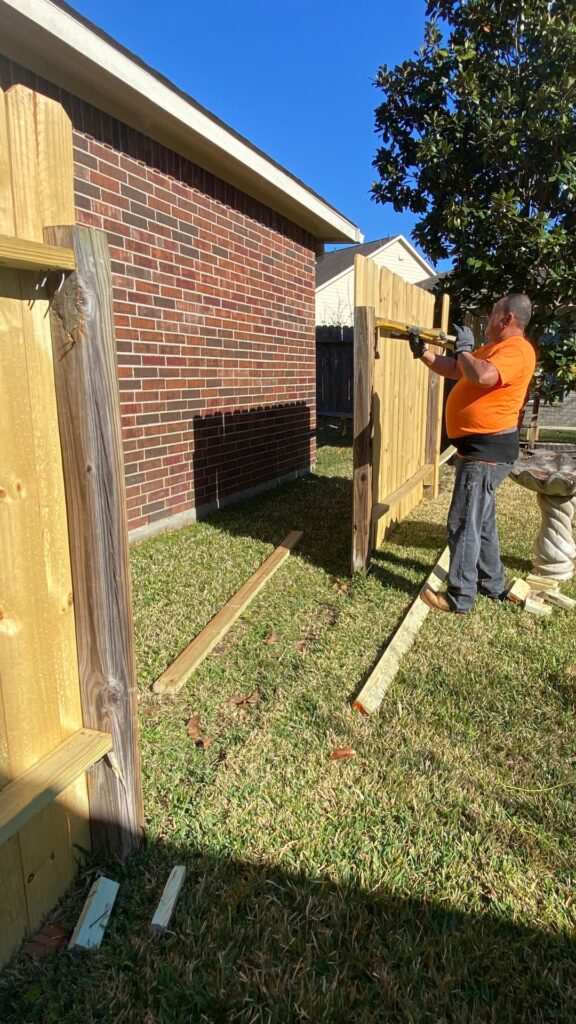 Completed section of a custom wood fence